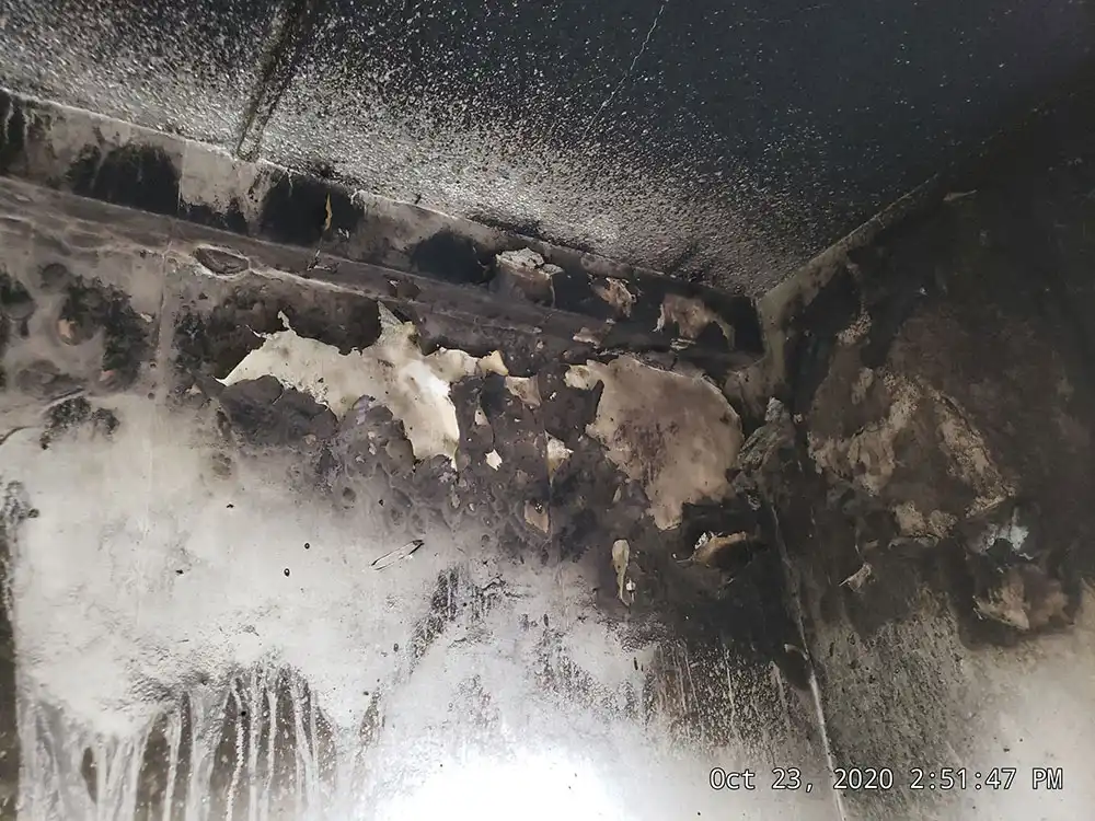 fire damaged wall and ceiling